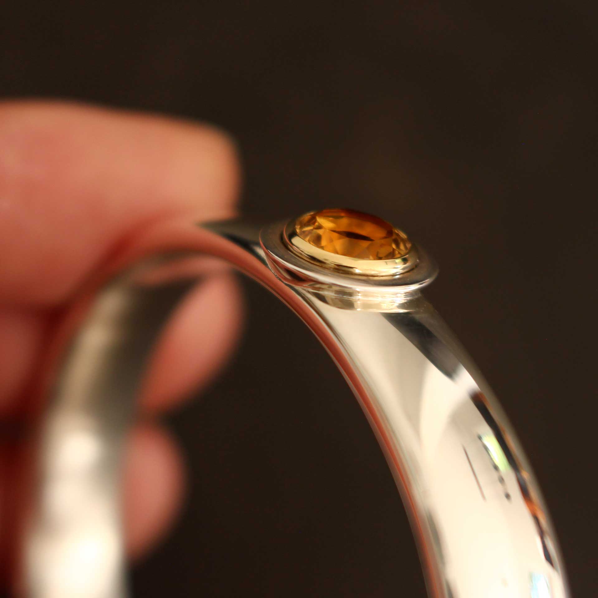 Silberarmreif geschlossen mit Gold und Citrin