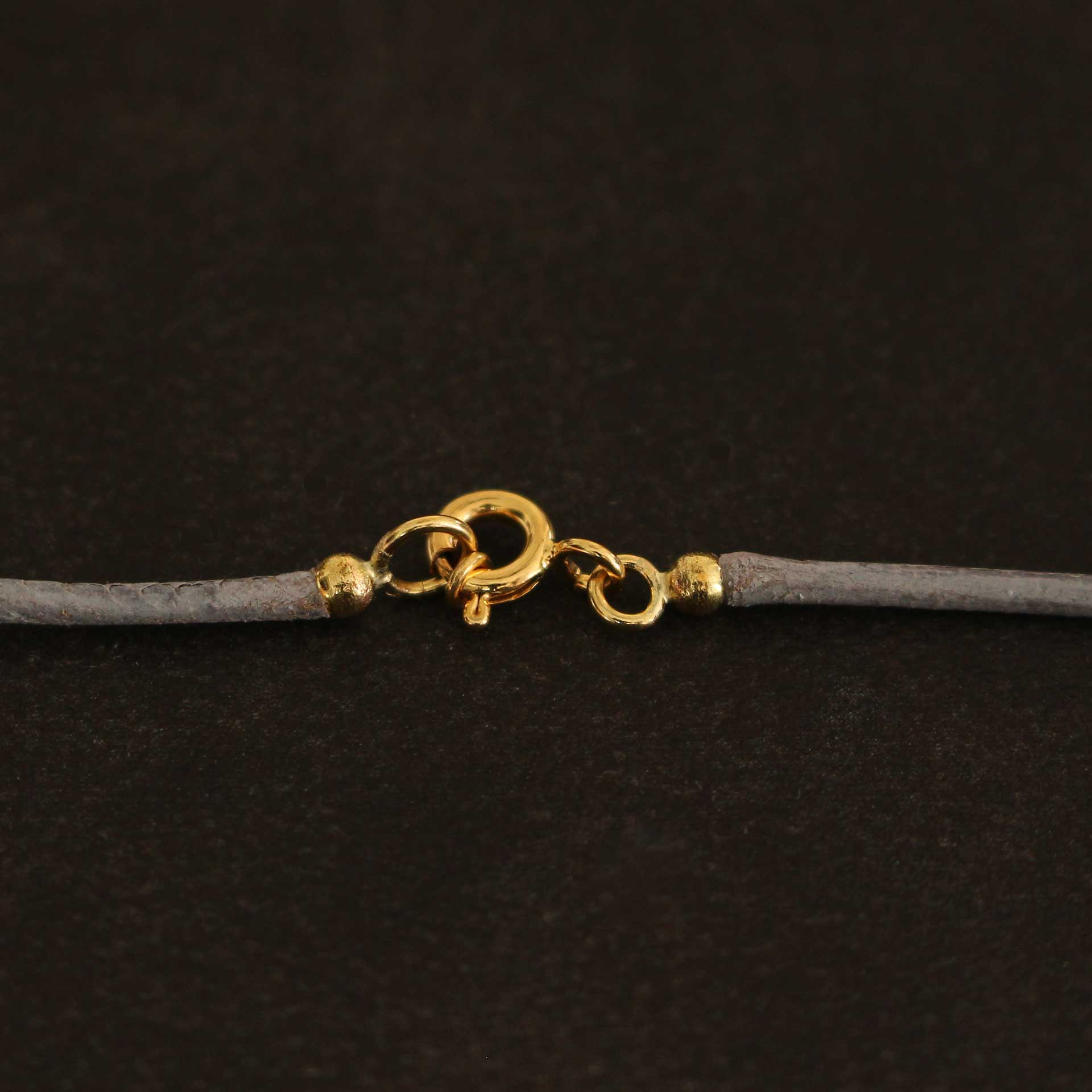 Kreuzanhänger Gelbgold 18ct. mit blauen Topasen