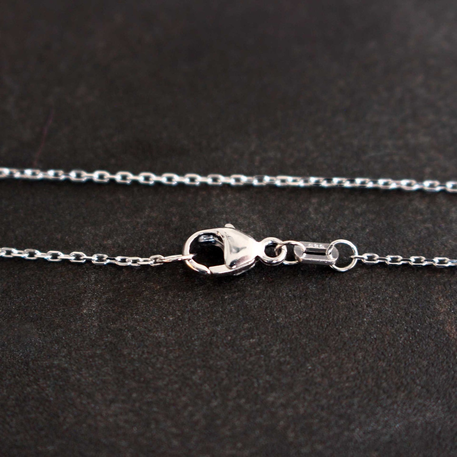 London Blue Topas Anhänger in 14 ct Weißgold mit Brillanten